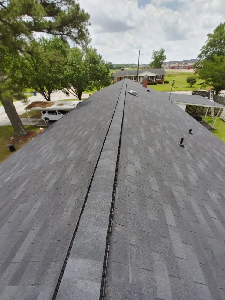 Slide of Action Roofing