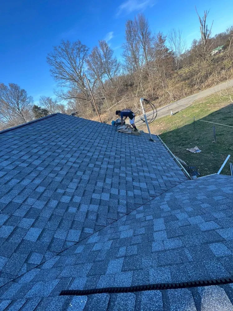 Slide of Acute Roofing