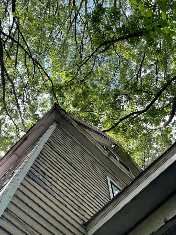 Slide of Acute Roofing