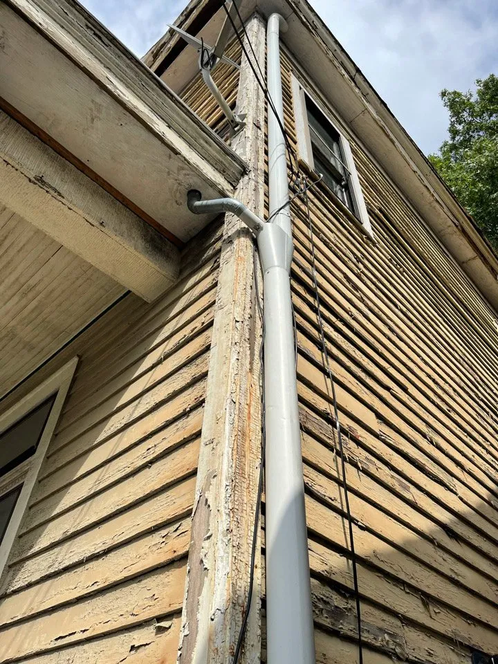 Slide of Acute Roofing