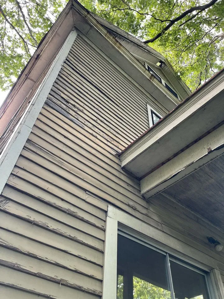 Slide of Acute Roofing