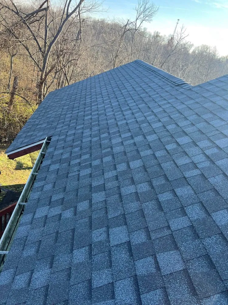 Slide of Acute Roofing