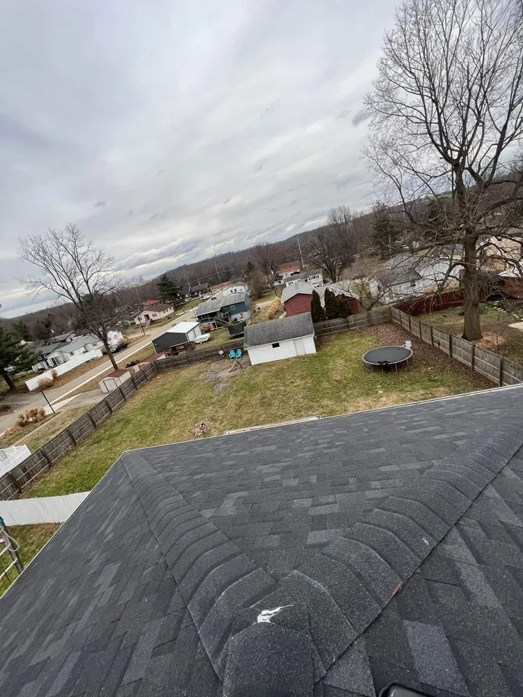 Slide of Acute Roofing