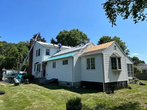 Slide of AD Roofing & Siding Experts