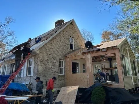 Slide of AD Roofing & Siding Experts