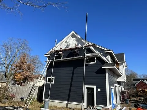 Slide of AD Roofing & Siding Experts