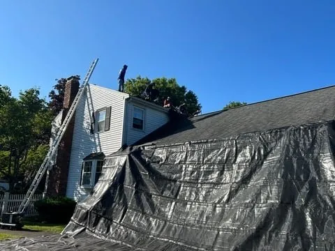 Slide of AD Roofing & Siding Experts