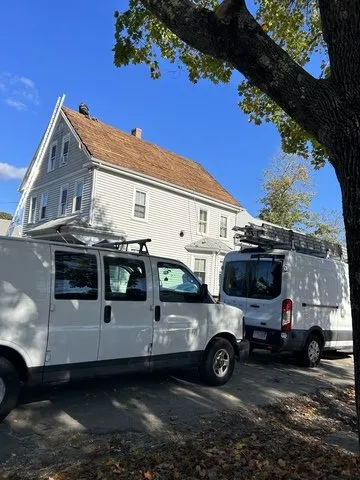 Slide of AD Roofing & Siding Experts