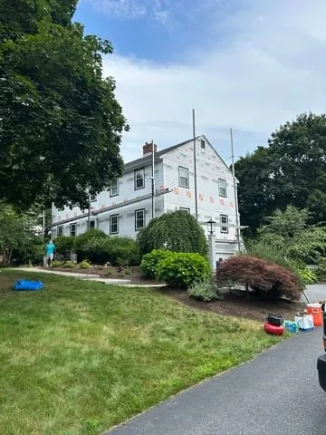 Slide of AD Roofing & Siding Experts