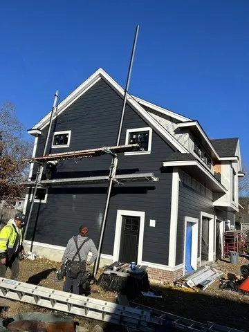 Slide of AD Roofing & Siding Experts