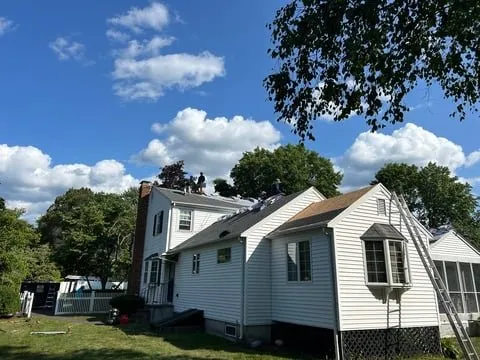 Slide of AD Roofing & Siding Experts