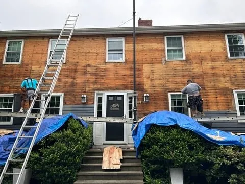 Slide of AD Roofing & Siding Experts