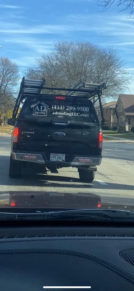 Slide of AD Roofing