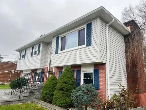 Slide of AD Roofing Siding & Gutters