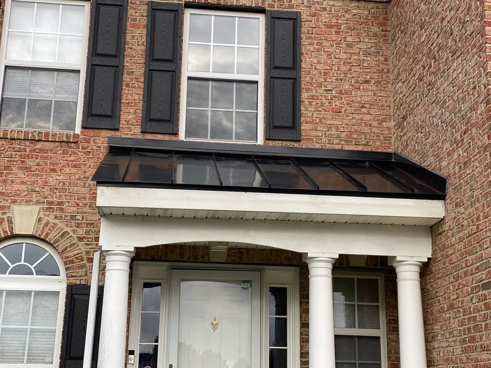 Slide of AD Roofing Siding & Gutters