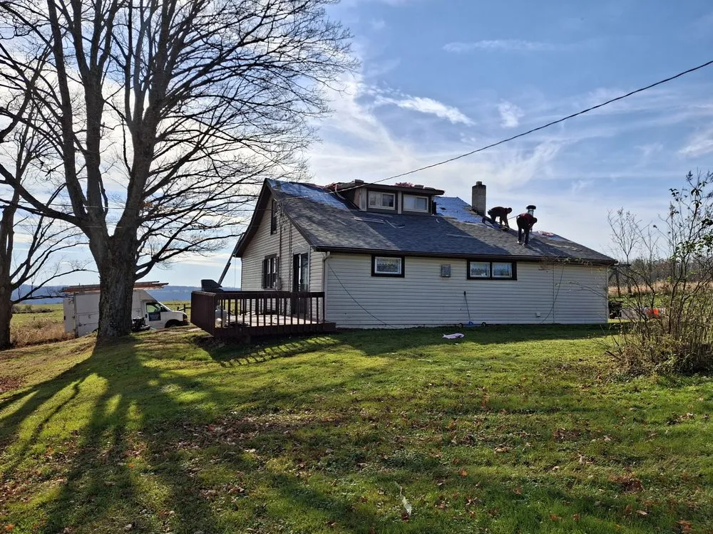 Slide of Adam Joseph Roofing