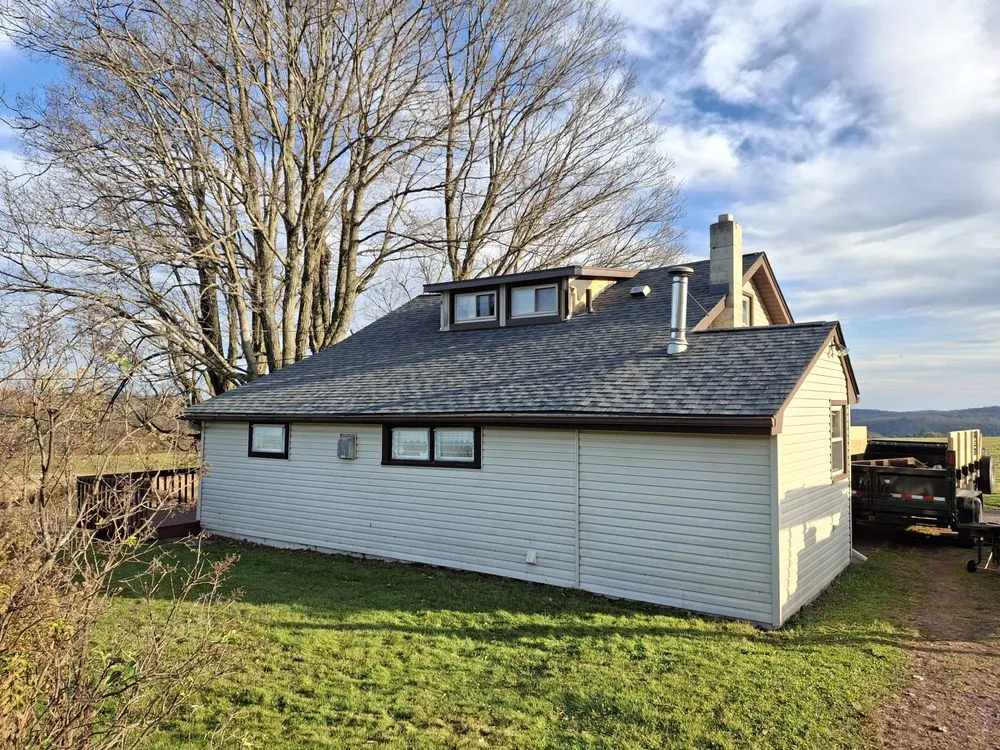 Slide of Adam Joseph Roofing