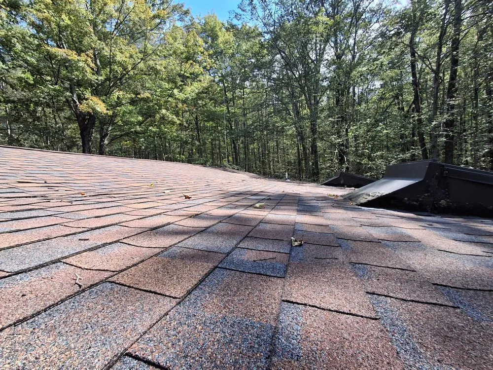 Slide of Adam Joseph Roofing