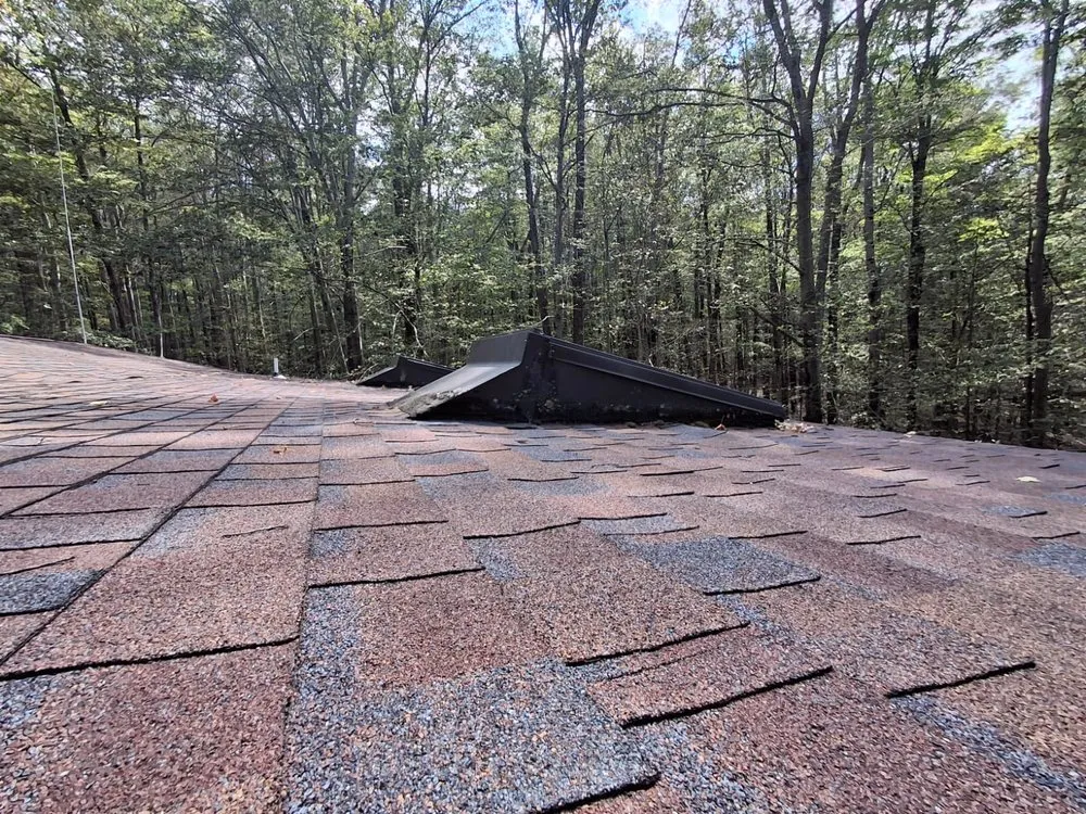 Slide of Adam Joseph Roofing