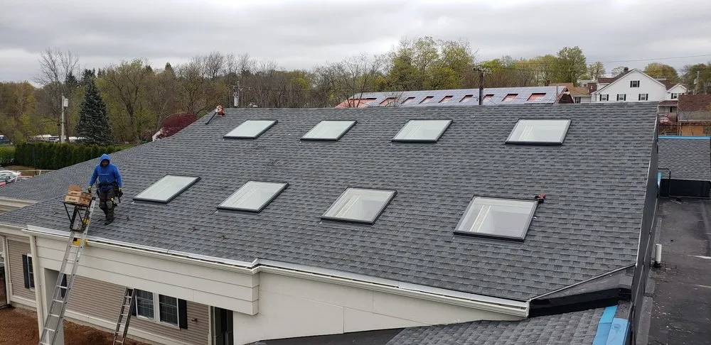 Slide of Adam Quenneville Roofing & Siding Greater Boston