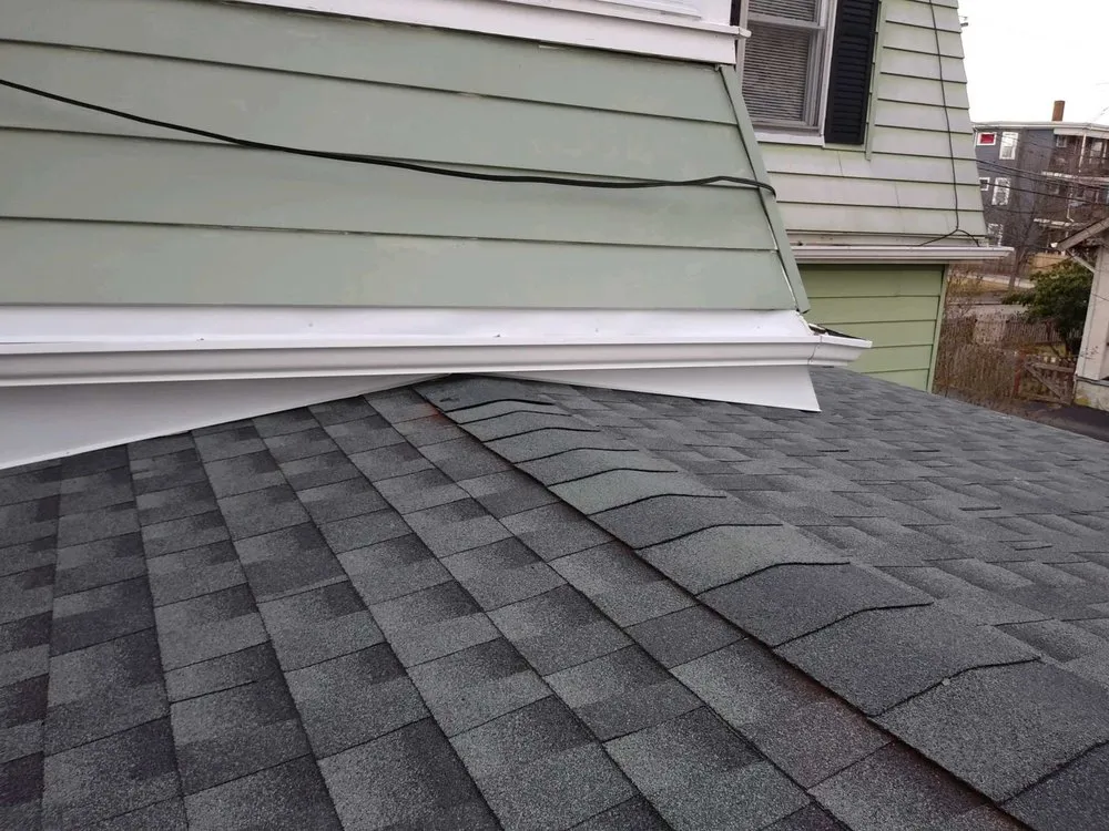 Slide of Adam Quenneville Roofing & Siding Greater Boston