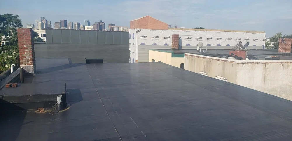 Slide of Adam Quenneville Roofing & Siding Greater Boston