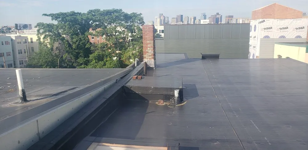 Slide of Adam Quenneville Roofing & Siding Greater Boston