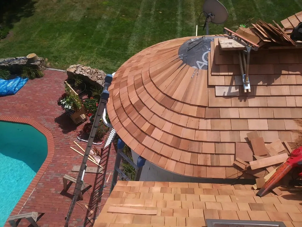 Slide of Adam Quenneville Roofing & Siding Greater Boston