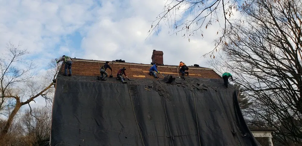 Slide of Adam Quenneville Roofing & Siding Greater Boston