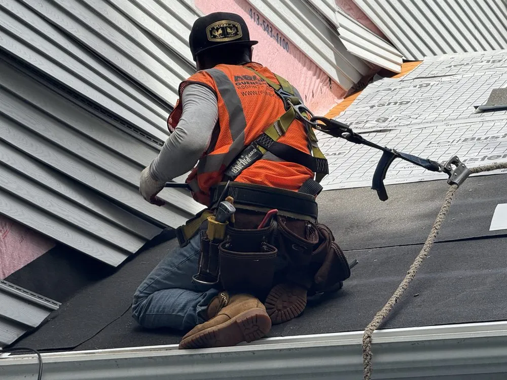 Slide of Adam Quenneville Roofing & Siding