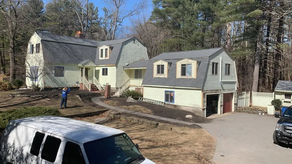 Slide of Adam Roofing