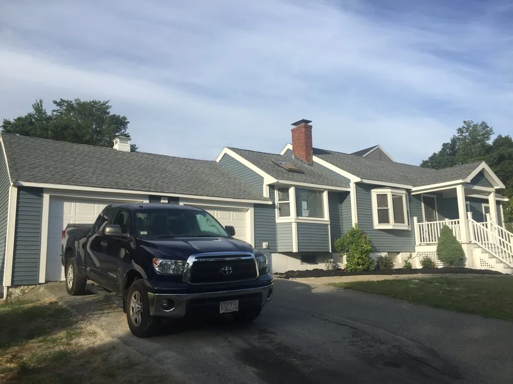 Slide of Adam Roofing