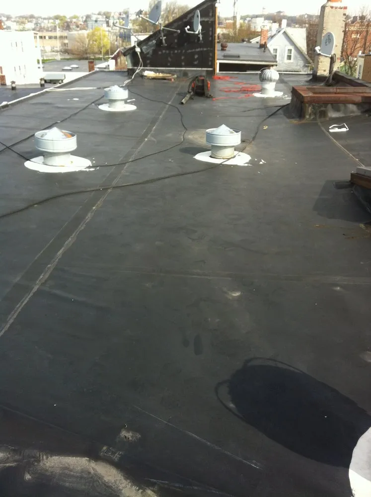 Slide of Adam Roofing