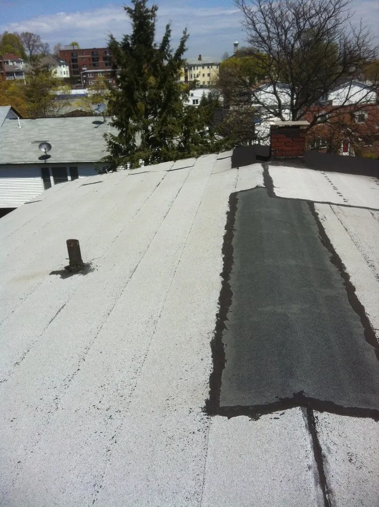 Slide of Adam Roofing