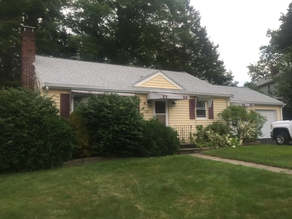 Slide of Adam Roofing