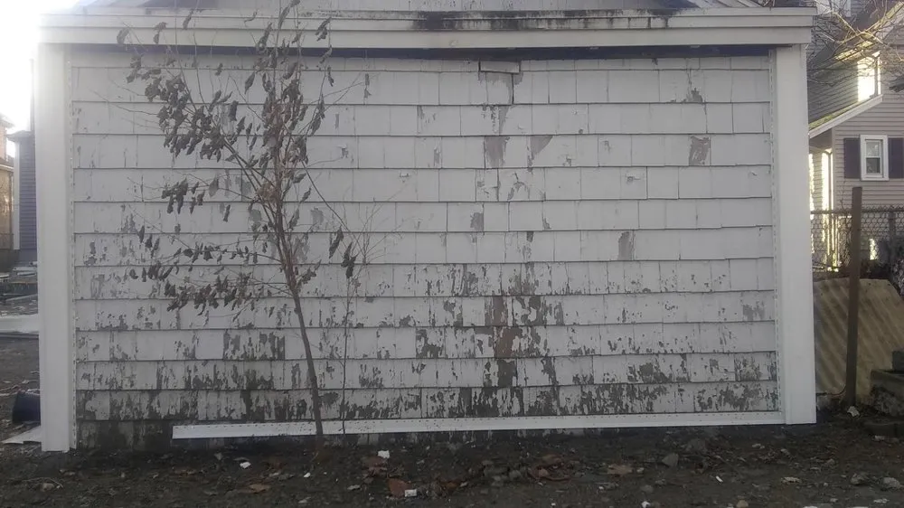 Slide of Adam Roofing