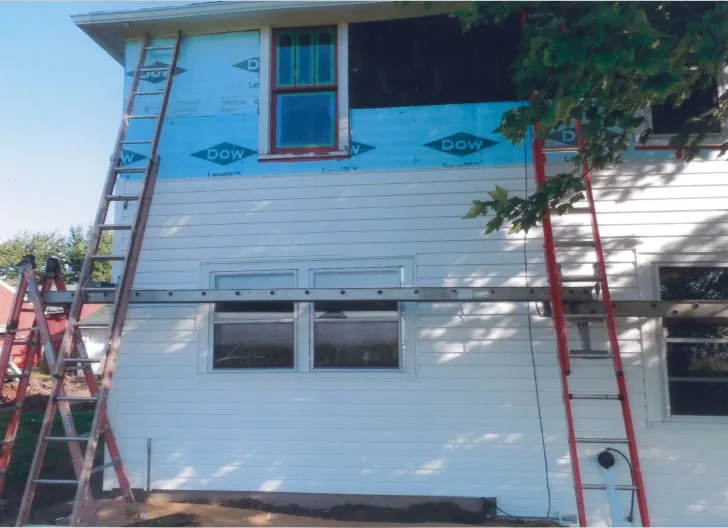 Slide of Adams & Sons Limited Roofing-Siding-Insulation