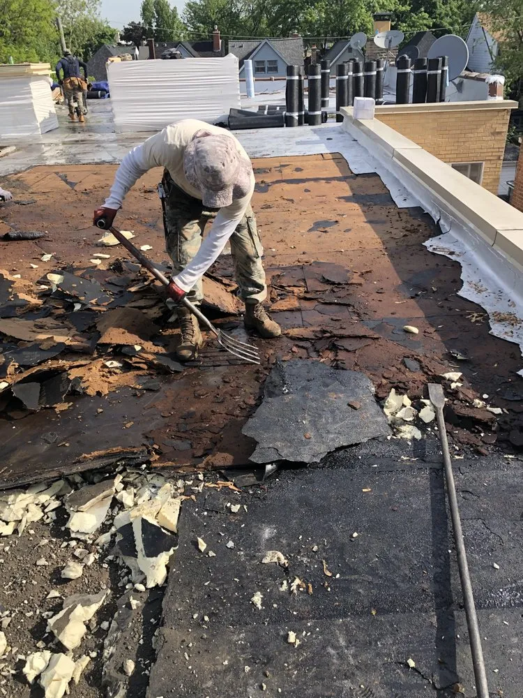 Slide of Adams Roofing & Tuckpointing