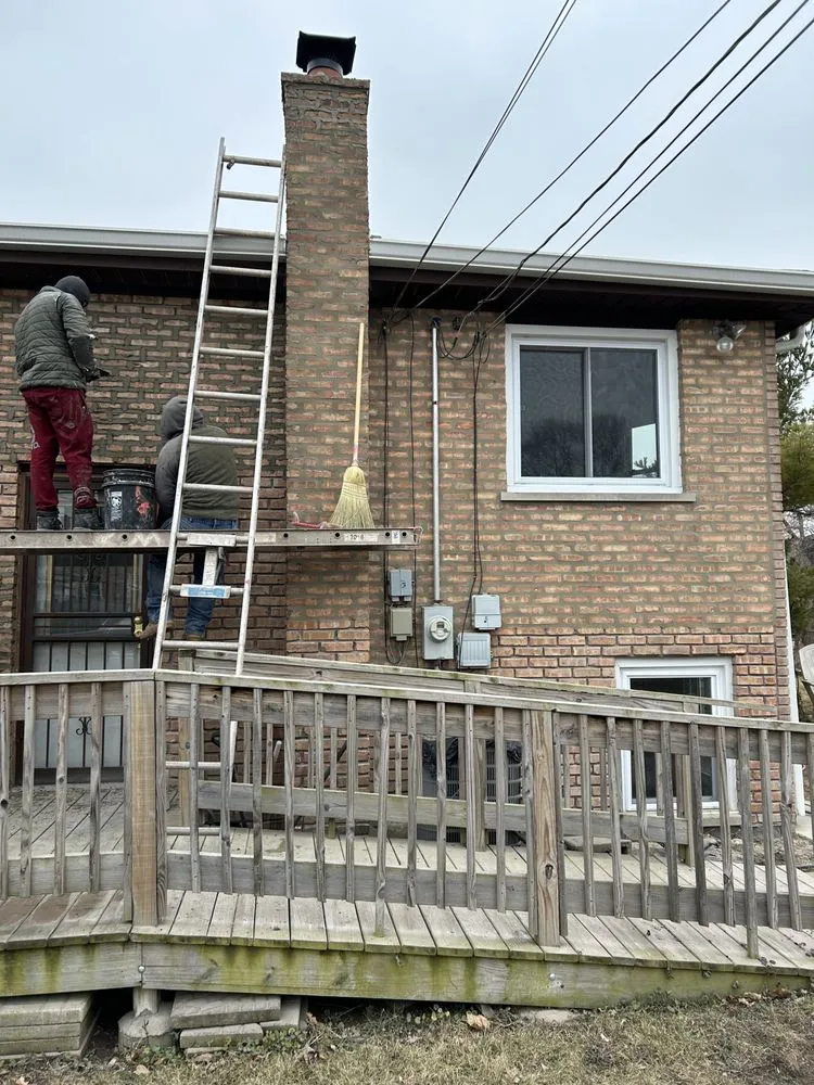 Slide of Adams Roofing & Tuckpointing