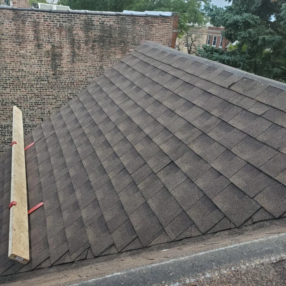 Slide of Adams Roofing & Tuckpointing