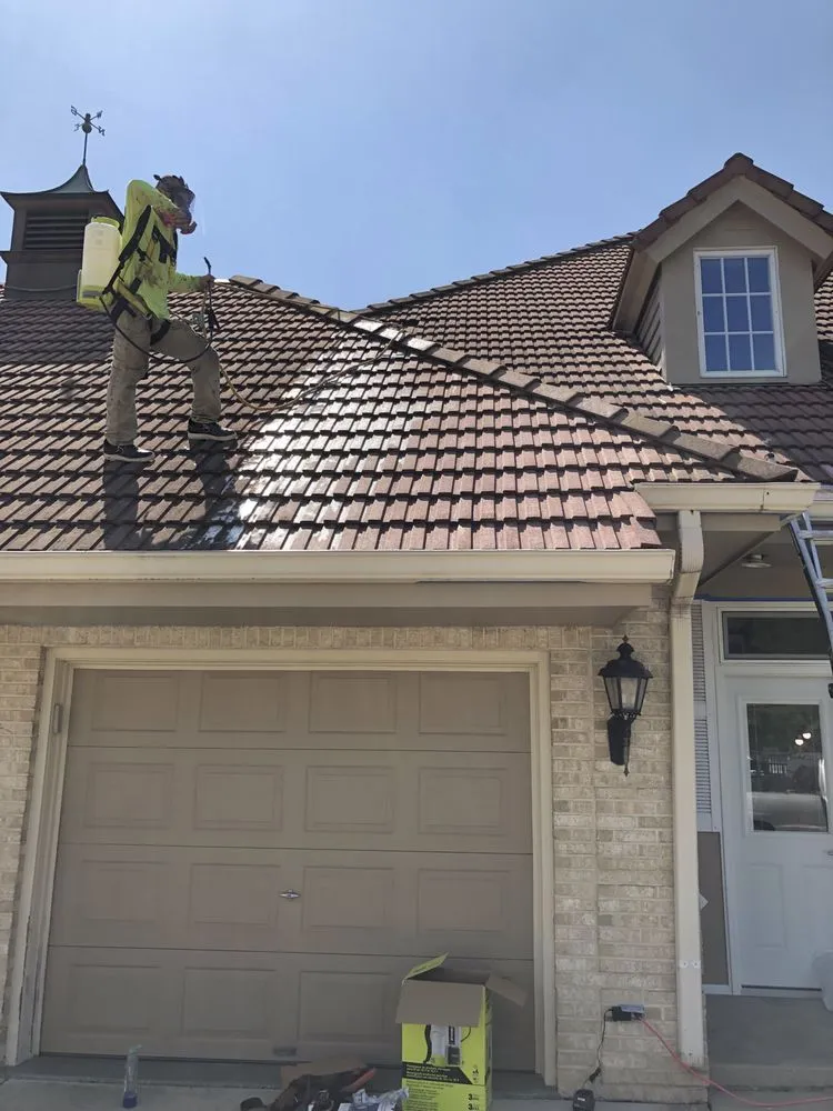 Slide of Adams Roofing & Tuckpointing