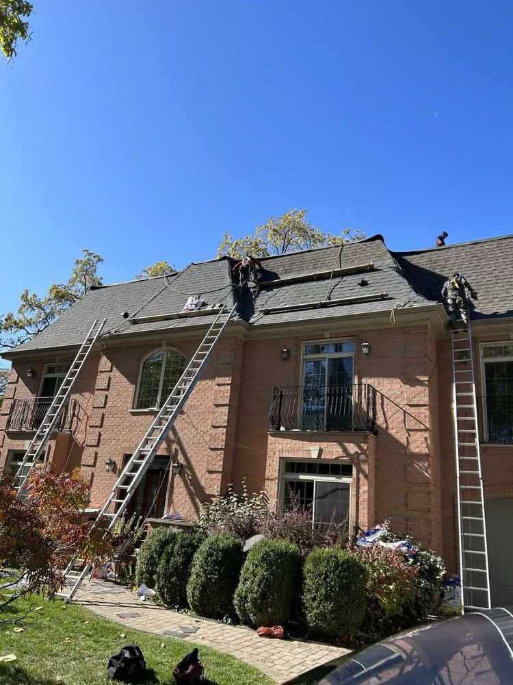 Slide of Adams Roofing & Tuckpointing