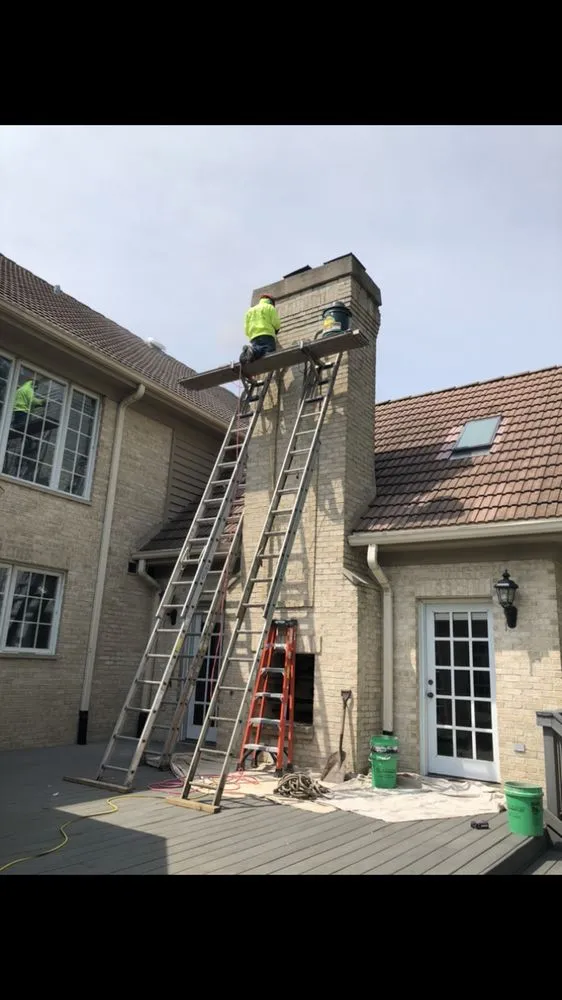 Slide of Adams Roofing & Tuckpointing