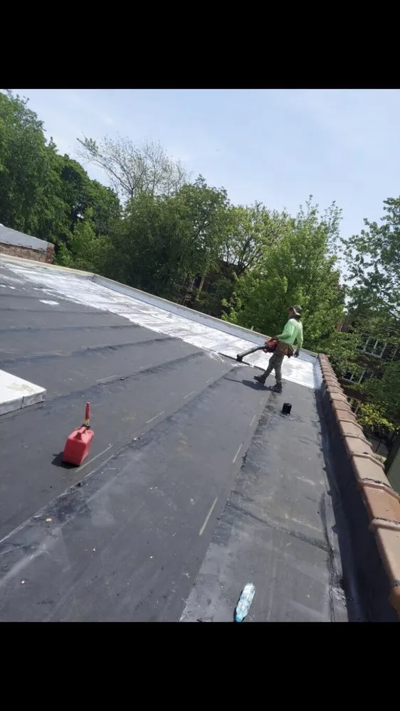 Slide of Adams Roofing & Tuckpointing