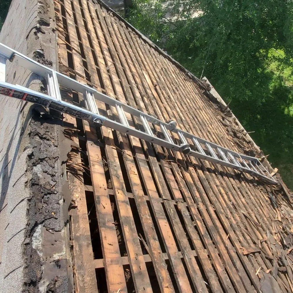 Slide of Adams Roofing & Tuckpointing