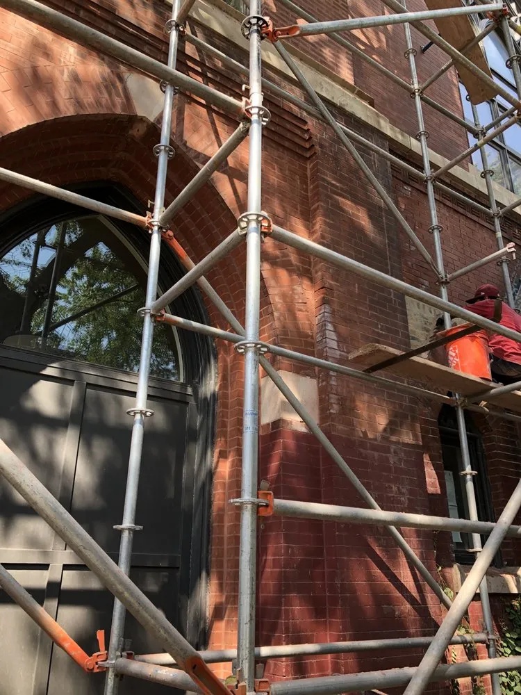 Slide of Adams Roofing & Tuckpointing