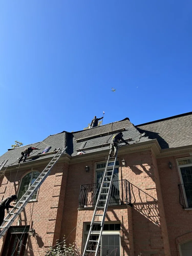Slide of Adams Roofing & Tuckpointing