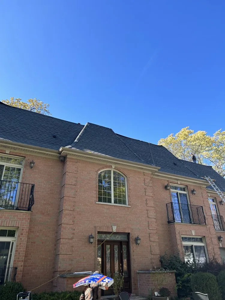 Slide of Adams Roofing & Tuckpointing