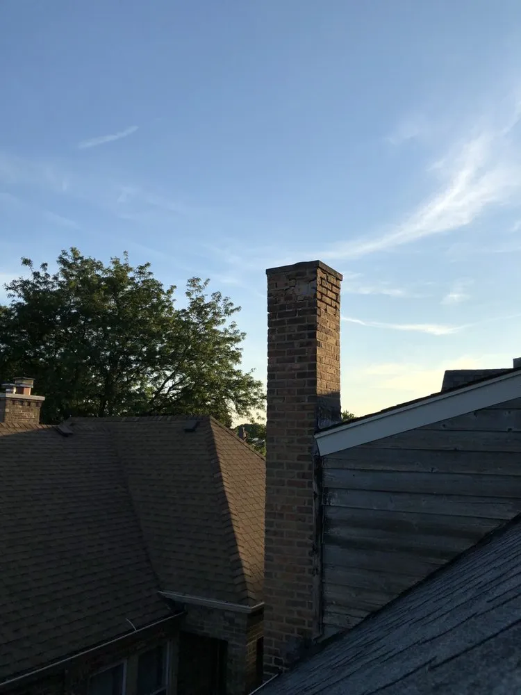 Slide of Adams Roofing & Tuckpointing