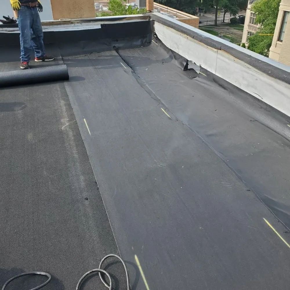 Slide of Adams Roofing & Tuckpointing